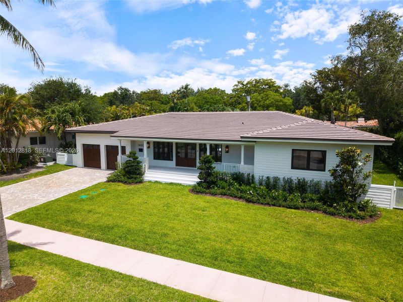 Front exterior of a new home in , Coral Gables, FL, highlighting curb appeal (Image 2). Front exterior of a new home in , Coral Gables, FL, highlighting curb appeal (Image 2).