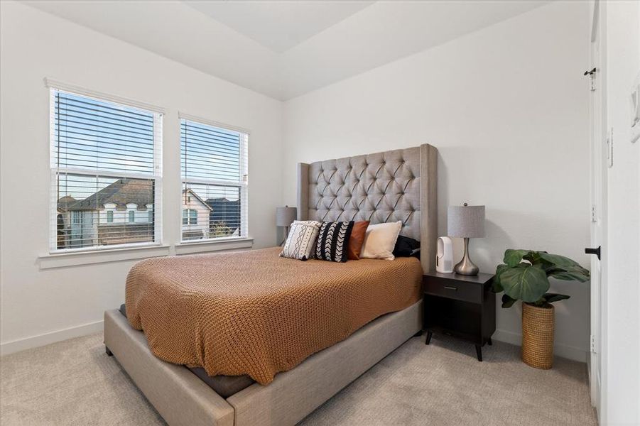 Bedroom with light colored carpet Bedroom with light colored carpet