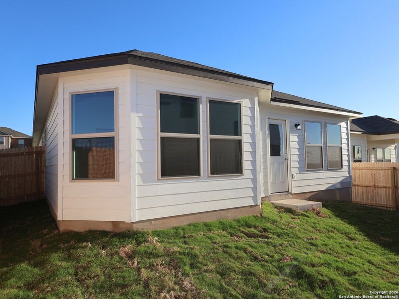 Exterior details and patio area of a home in Paloma Park, Converse (Image 4).