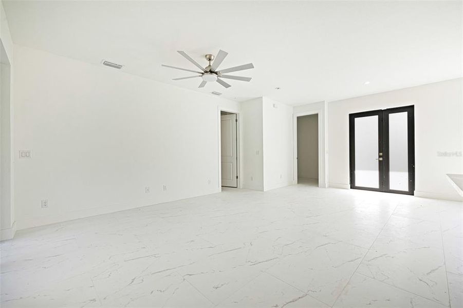 Spacious, unfurnished interior of a new home in , Port Charlotte (Image 28).