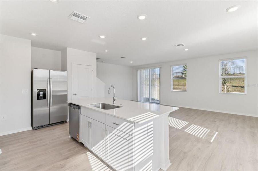 Furnished interior view inside a new home in The Reserve at Hammock Oaks Townes, Lady Lake (Image 9).