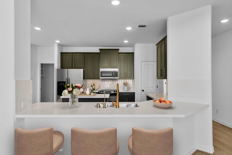 Kitchen. Sample product photo. Actual exterior and interior selections may vary by homesite. Photo may be virtually staged. Kitchen. Sample product photo. Actual exterior and interior selections may vary by homesite. Photo may be virtually staged.