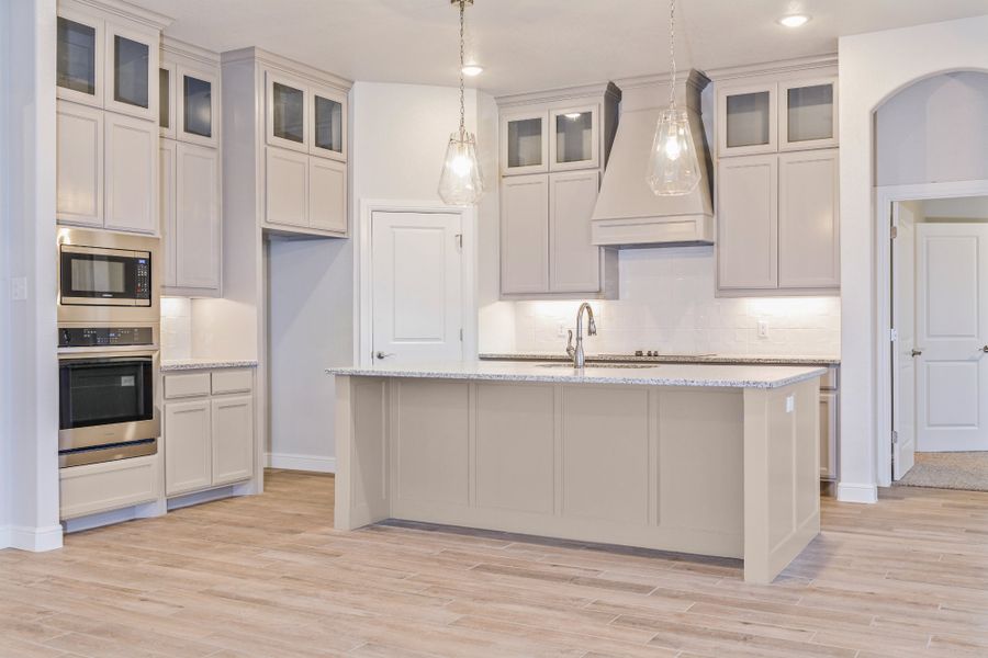 Representative furnished interior of a home built from the The Hudson by Doug Parr Custom Homes in Monarch Manor, Poolville (Image 6).