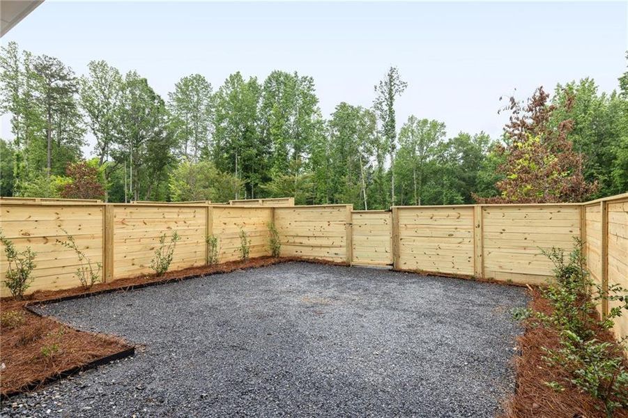 Exterior details and patio area of a home in , Chattahoochee Hills (Image 23).