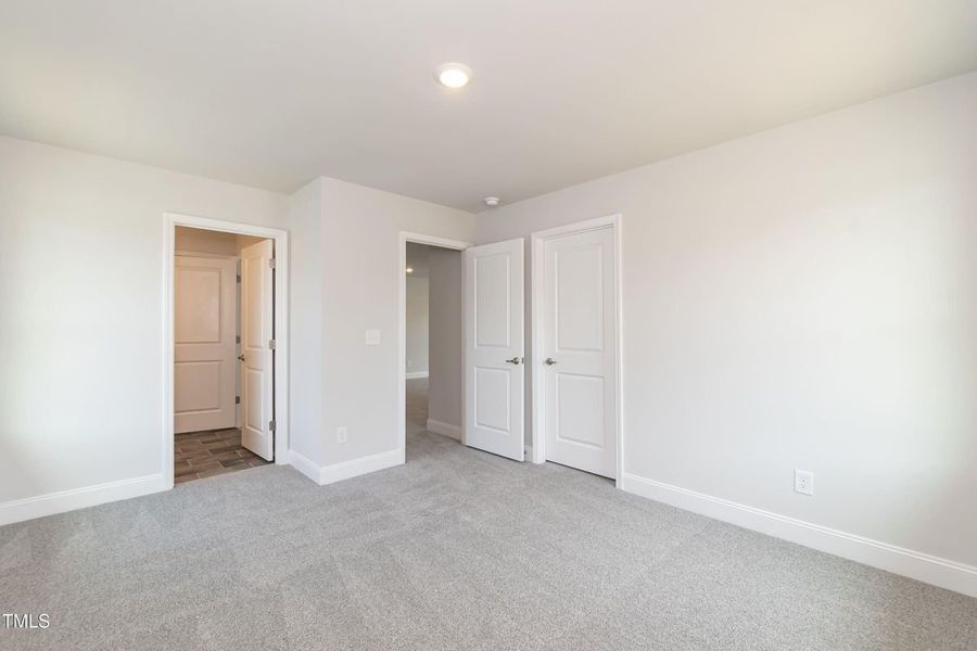 Representative unfurnished interior of a home built from the 2709 by Adams Homes in The Grove at Ballard, Jacksonville (Image 32).