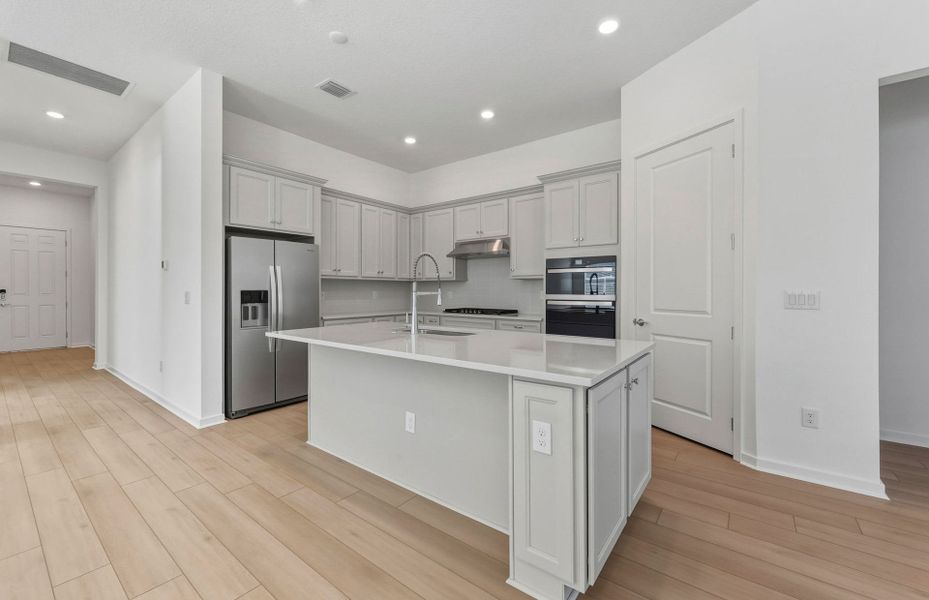 Furnished interior view inside a new home in Del Webb River Reserve, Spring Hill (Image 6).
