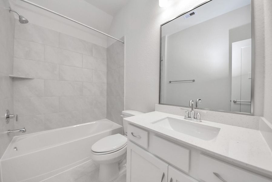 Furnished interior view inside a new home in Sunrise Cove: Landmark Collection, Texas City (Image 6).