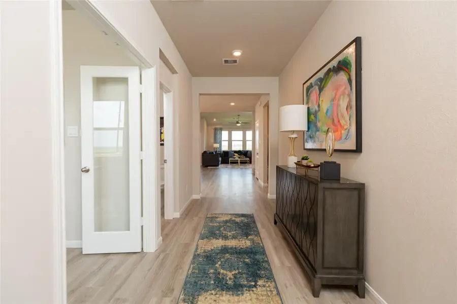 Sample photo of completed home with similar plan. As-built color and selections may vary.