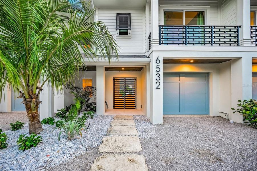 Front exterior of a new home in , Sarasota, FL, highlighting curb appeal (Image 22).