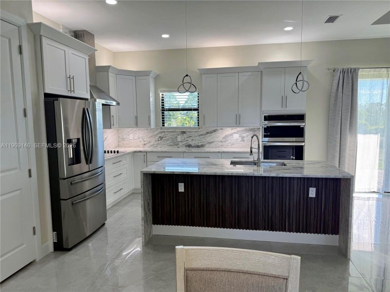 Furnished interior view inside a new home in , Lehigh Acres (Image 10).