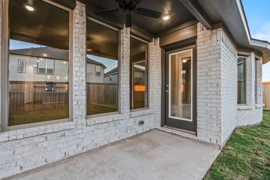 Exterior details and patio area of a home in Bridgeland, Cypress (Image 3).