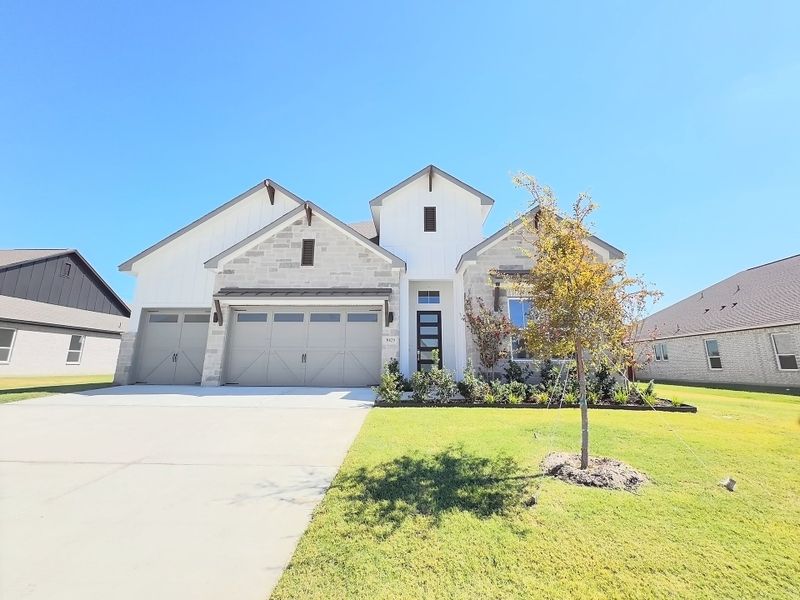 Front exterior of a new home in Polo Ridge, Mesquite, TX, highlighting curb appeal (Image 17).