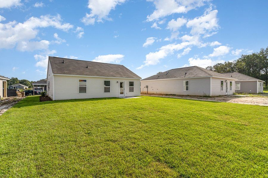 Representative exterior photo of a completed home built from the CURTIS by D.R. Horton in Auberon Woods, Conway, SC (Image 20).