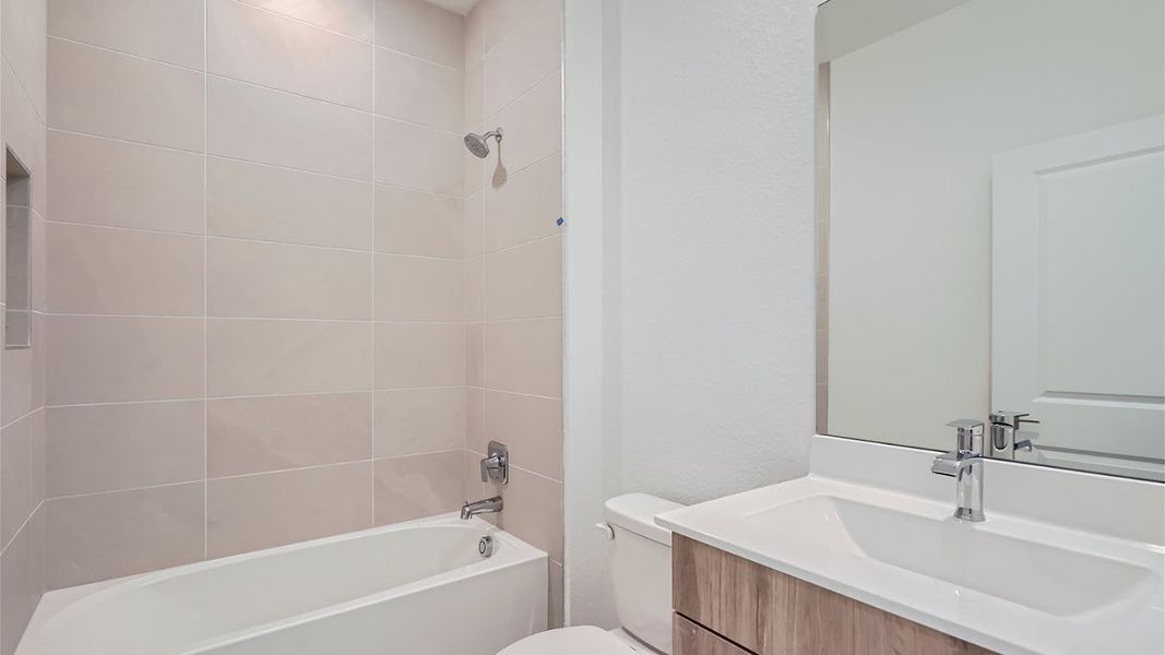 Representative furnished interior of a home built from the Avon by D.R. Horton in Preserves at Park Trace, Stuart (Image 10).