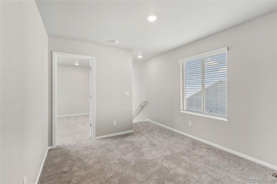 Spacious, unfurnished interior of a new home in Woodrose at Painted Prairie, Aurora (Image 19).