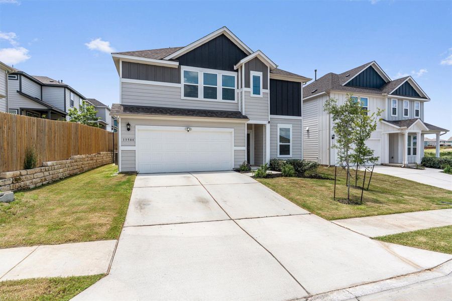 View of front of home front entry  attached garage