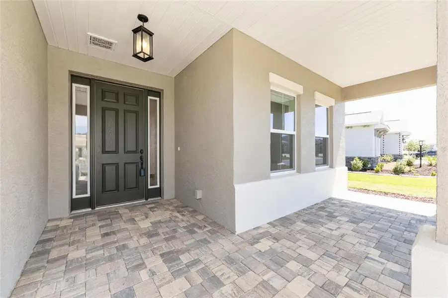 Exterior details and patio area of a home in , Ocala (Image 26).