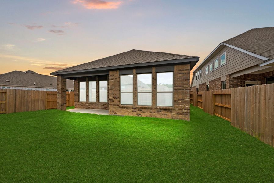 Exterior details and patio area of a home in The Trails, New Caney (Image 16).
