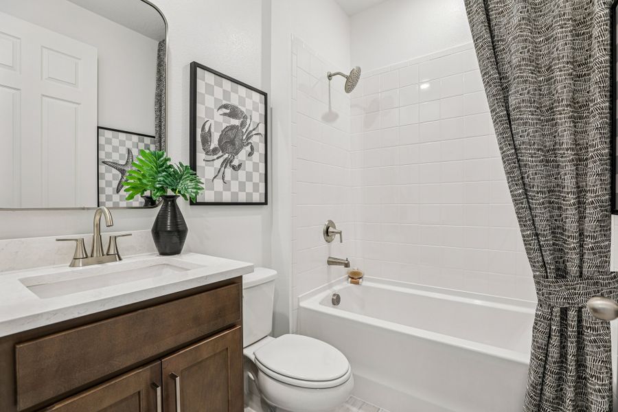 Representative furnished interior of a home built from the Briella by Risewell Homes in Country Club Estates, Palm Bay (Image 15).