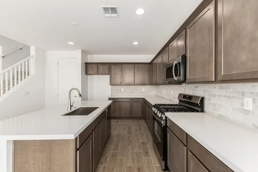 Furnished interior view inside a new home in Elara at Moonlight, Maricopa (Image 4). Furnished interior view inside a new home in Elara at Moonlight, Maricopa (Image 4).