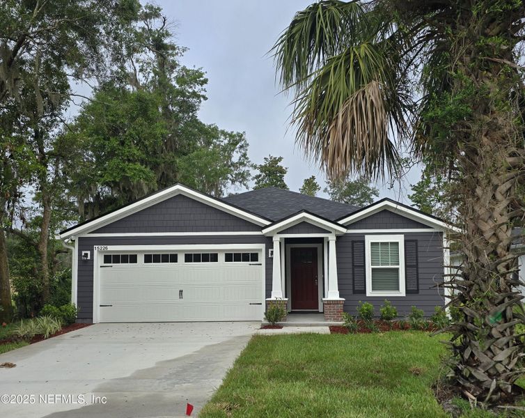 Front exterior of a new home in , Jacksonville, FL, highlighting curb appeal (Image 1). Front exterior of a new home in , Jacksonville, FL, highlighting curb appeal (Image 1).