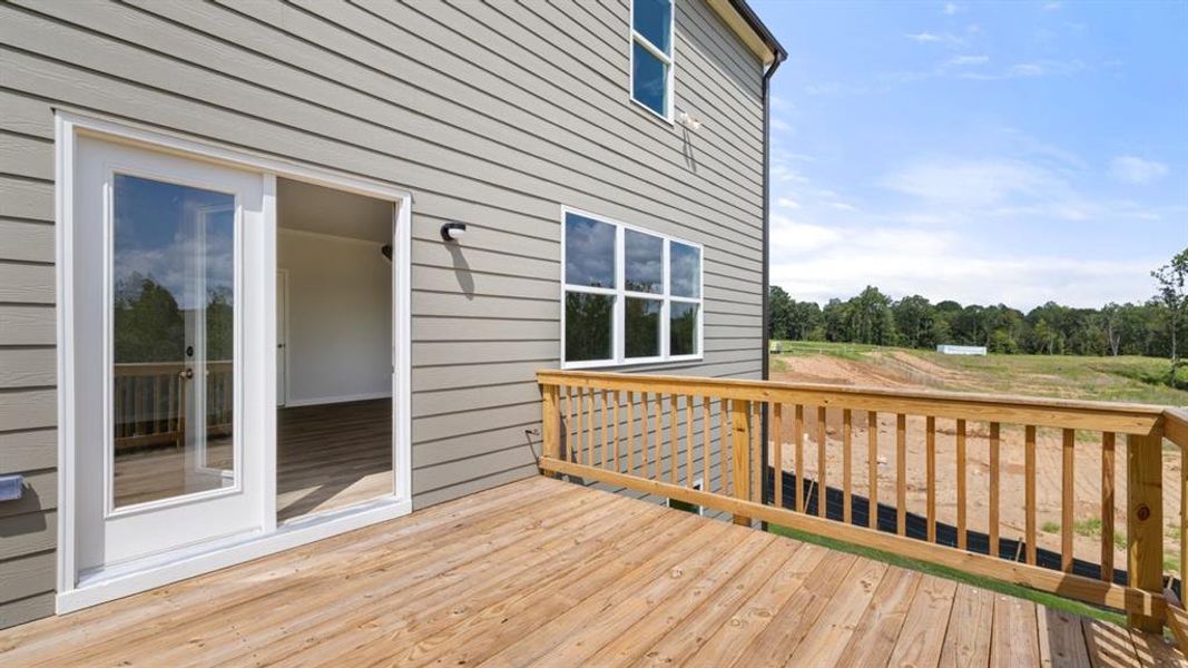 Front exterior of a new home in Sheffield Highlands, Dallas, GA, highlighting curb appeal (Image 2).
