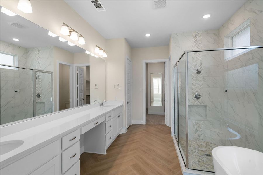 Furnished interior view inside a new home in Woodson’s Reserve, Spring (Image 15).