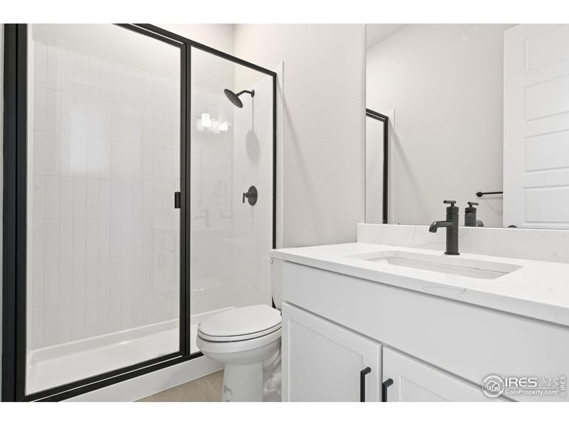 Furnished interior view inside a new home in Festival at RainDance, Windsor (Image 4).