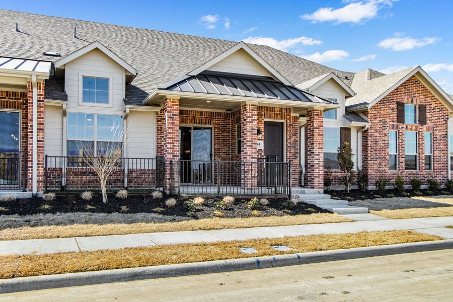 Front exterior of a new home in Woodbridge Villas, Wylie, TX, highlighting curb appeal (Image 1). Front exterior of a new home in Woodbridge Villas, Wylie, TX, highlighting curb appeal (Image 1).