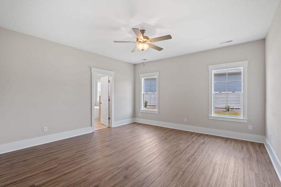 Representative unfurnished interior of a home built from the Kauai by Bill Clark Homes in The Sanctuary at Sunset Beach, Sunset Beach (Image 19). Representative unfurnished interior of a home built from the Kauai by Bill Clark Homes in The Sanctuary at Sunset Beach, Sunset Beach (Image 19).