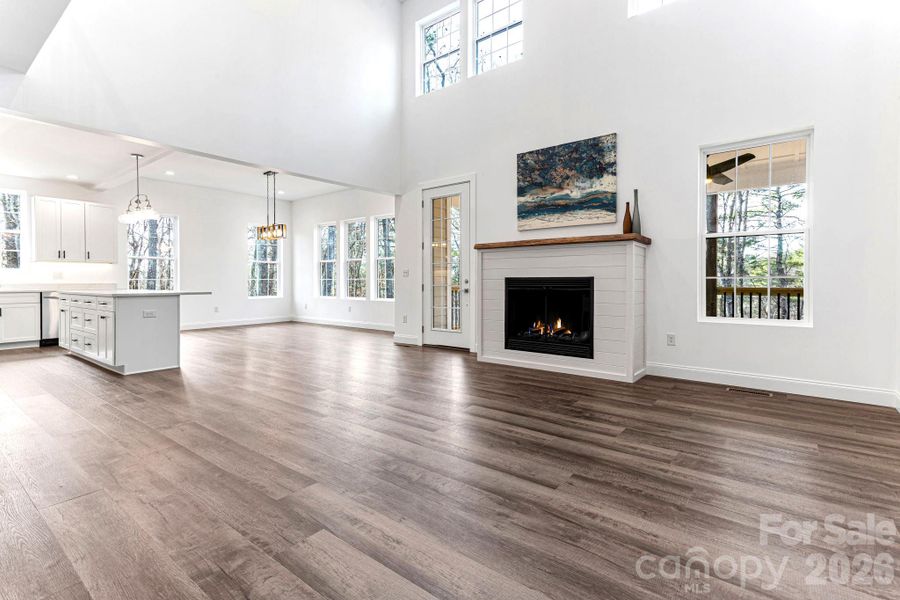 Living Room, Dining Room, Partial Kitchen Living Room, Dining Room, Partial Kitchen