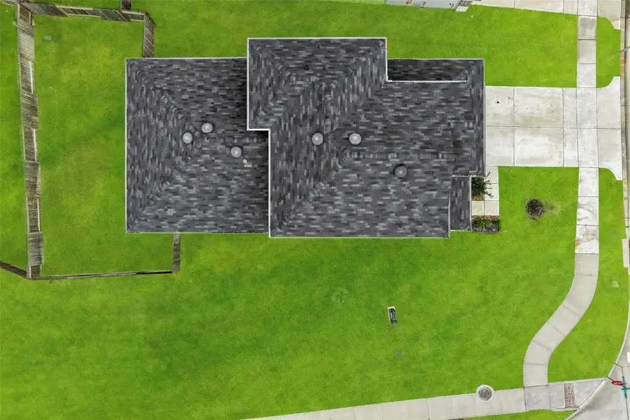 Aerial view showcasing the premium corner lot. Aerial view showcasing the premium corner lot.