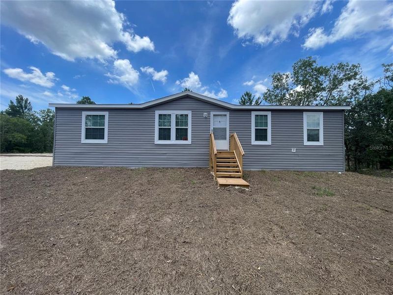 Exterior details and patio area of a home in , Ocala (Image 3).
