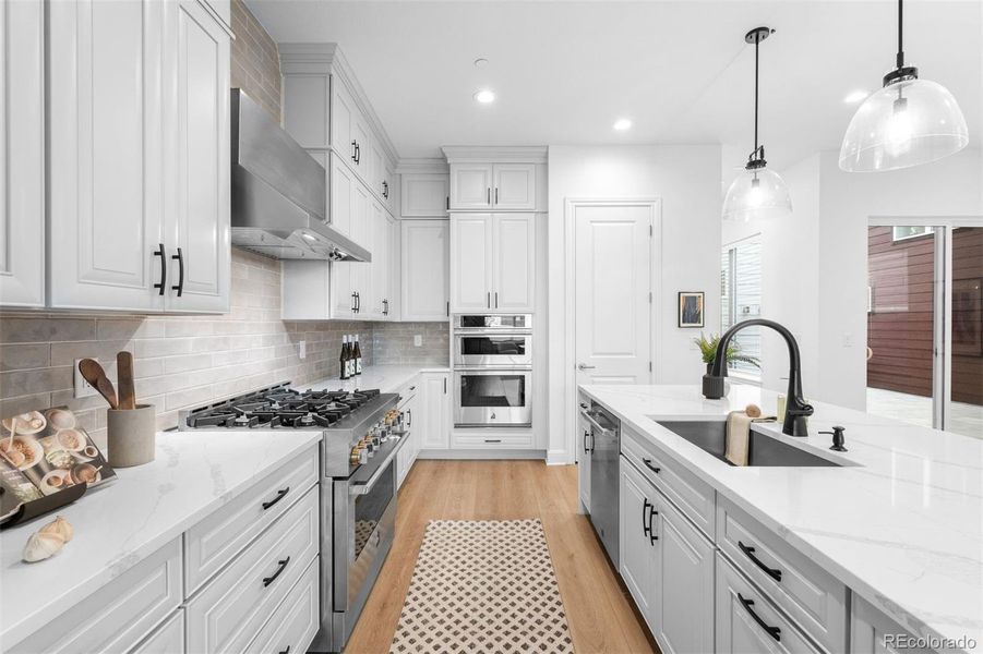 Cabinetry stretches to ceiling for optimal space