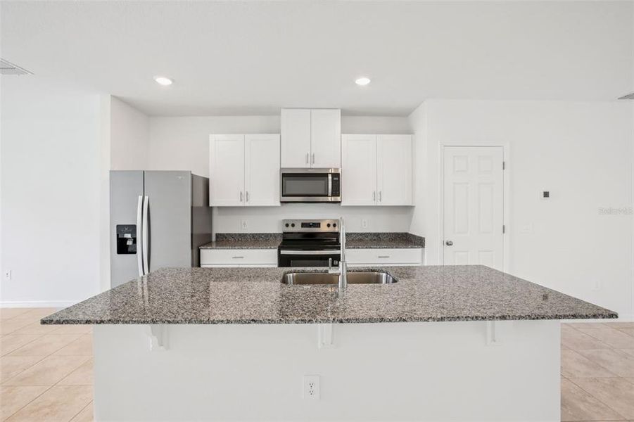 Furnished interior view inside a new home in Villamar - Classic Series, Winter Haven (Image 8).