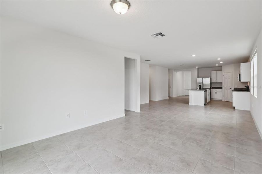 Spacious, unfurnished interior of a new home in Lake Deer Estates - Signature Series, Poinciana (Image 21).