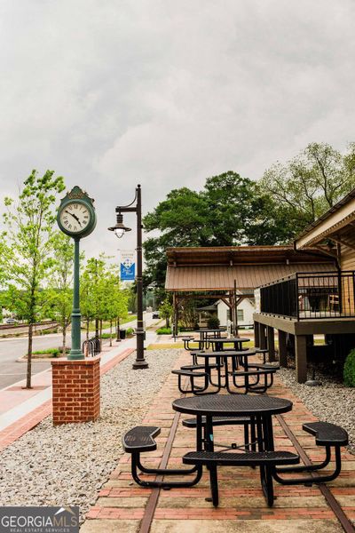 Front exterior of a new home in Ponderosa Farms Manor, Gainesville, GA, highlighting curb appeal (Image 47).