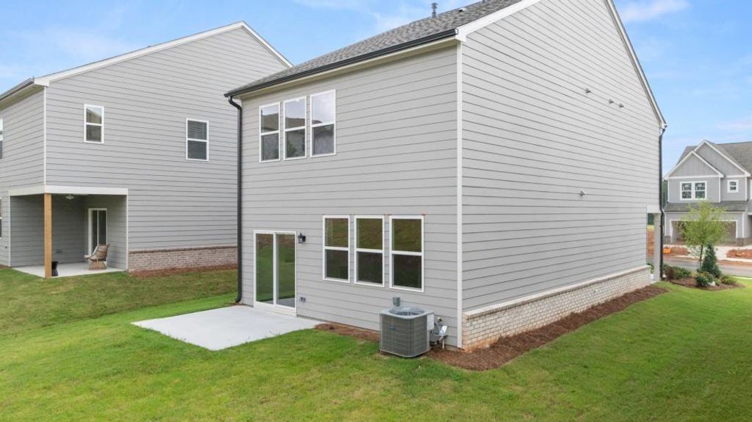 Exterior details and patio area of a home in Timber Ridge: Timber Ridge 42', Douglasville (Image 20).