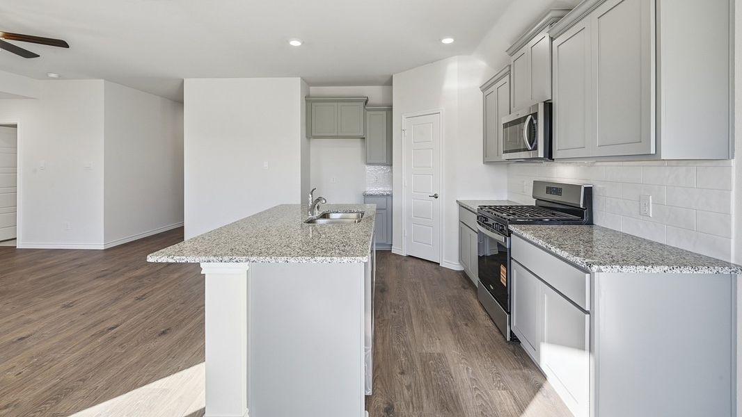 Representative furnished interior of a home built from the Brookshire by D.R. Horton in Windchime, Celina (Image 4).