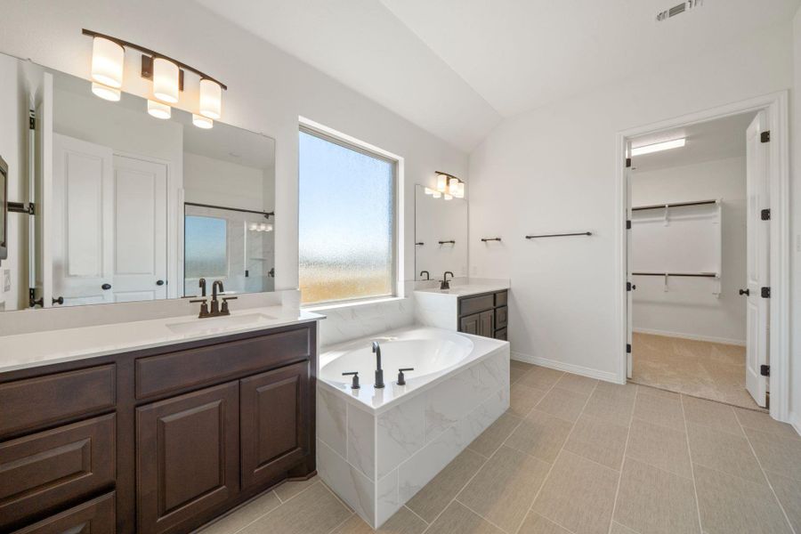 Primary Bath retreat with dual vanities & garden tub