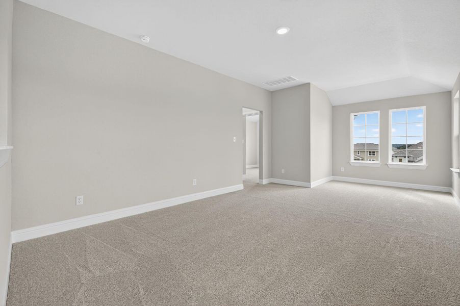 Unfurnished room featuring carpet flooring
