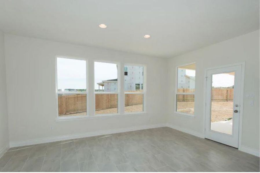 Photo of Pulte home with same floor plan, not of actual home listed.