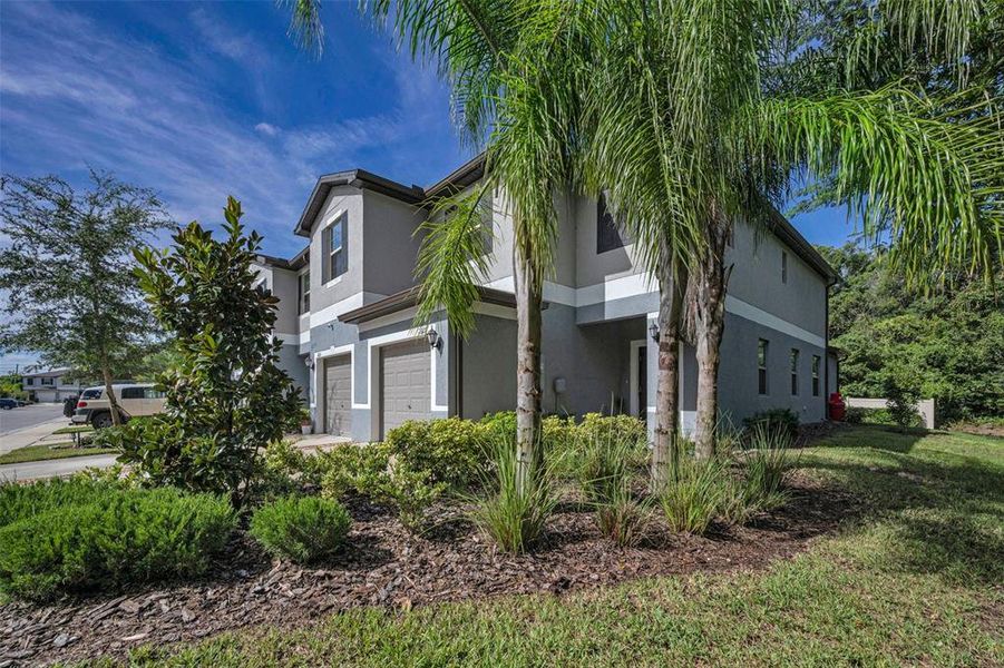 Front exterior of a new home in , Holiday, FL, highlighting curb appeal (Image 21).