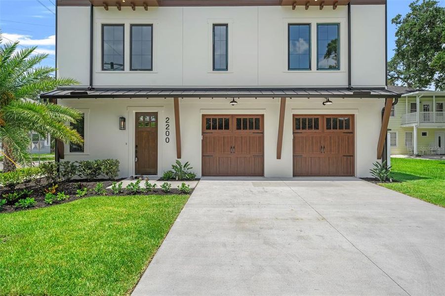 Front exterior of a new home in , Tampa, FL, highlighting curb appeal (Image 25). Front exterior of a new home in , Tampa, FL, highlighting curb appeal (Image 25).