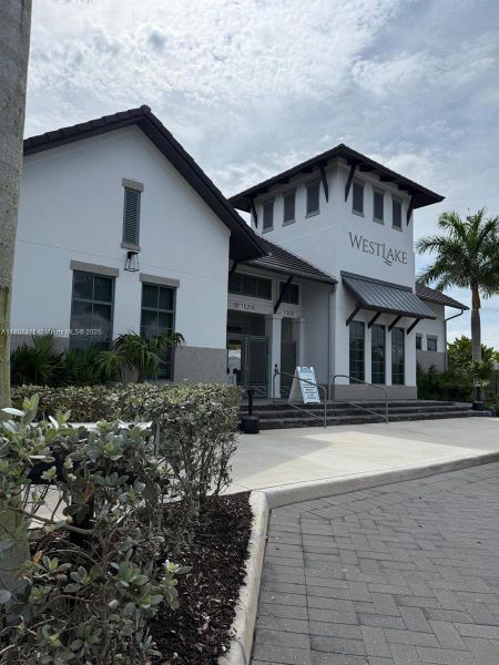 Front exterior of a new home in , Westlake, FL, highlighting curb appeal (Image 22).