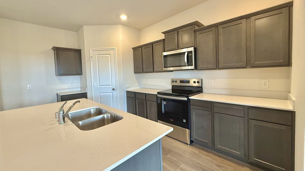 Representative furnished interior of a home built from the HUNTSVILLE by D.R. Horton in Northspur, Forney (Image 5). Representative furnished interior of a home built from the HUNTSVILLE by D.R. Horton in Northspur, Forney (Image 5).