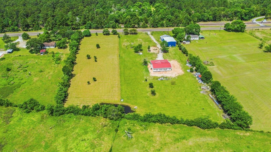 Welcome home to 912 FM 405—your 4.92-acre unrestricted slice of paradise nestled among the trees in Huntsville, TX!