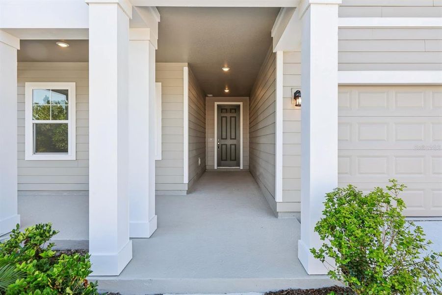 Exterior details and patio area of a home in Ellington Traditional, St. Cloud (Image 2). Exterior details and patio area of a home in Ellington Traditional, St. Cloud (Image 2).