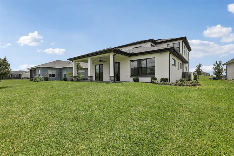 Exterior details and patio area of a home in , Auburndale (Image 3).