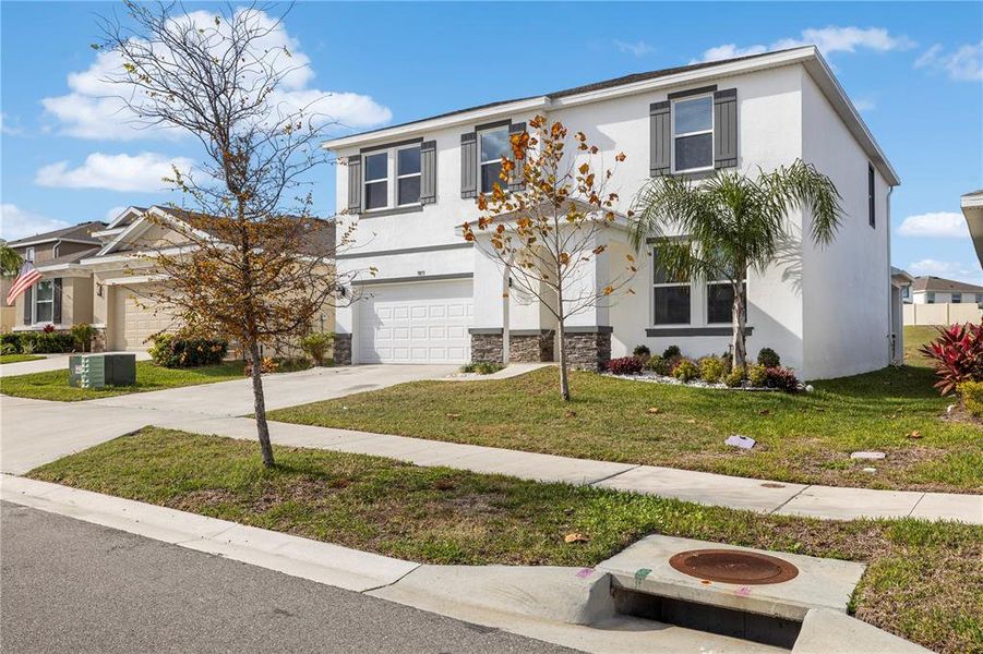 Front exterior of a new home in , Wesley Chapel, FL, highlighting curb appeal (Image 29).